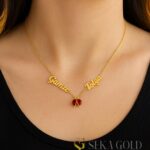 Naamketting met twee namen en lieveheersbeestje – 925 sterling zilver