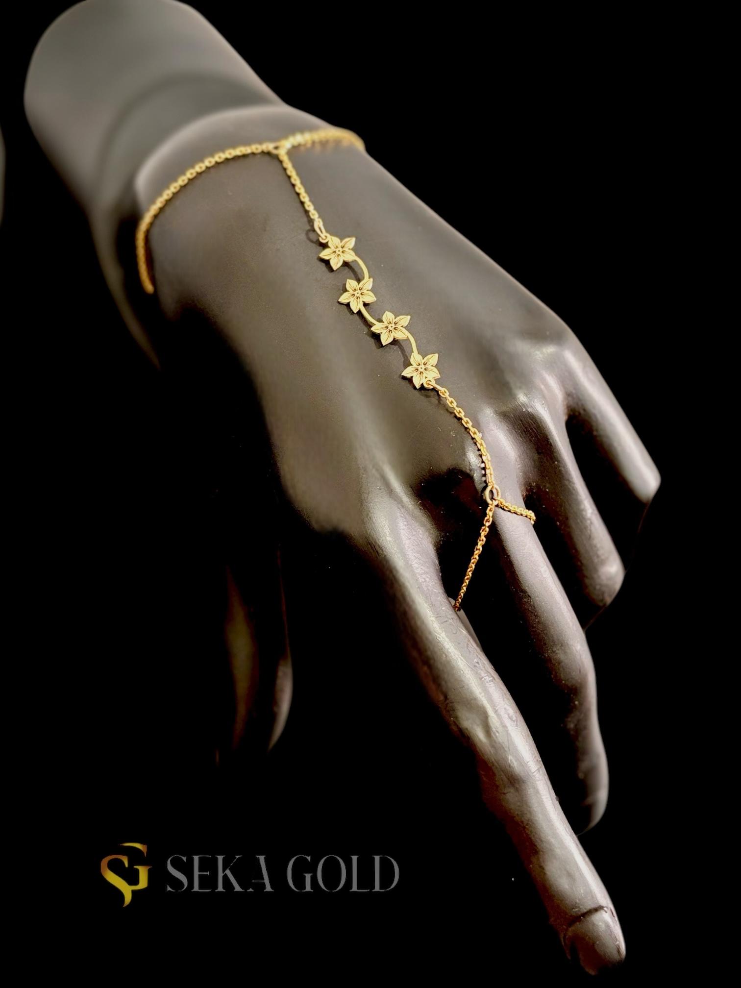 dddb7bbe-71b7-4a7b-98a3-2f270c6e4636.jpeg Schahmaran-Armband mit Blumenmotiv – 925er Sterlingsilber mit 22 Karat Vergoldung – Image 1